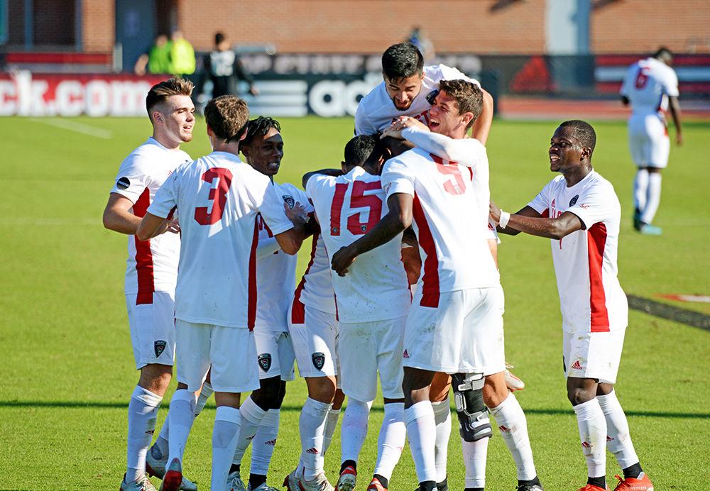Following sophomore forward Kuda Muskwe&#8217;s goal, the team celebrates in Dail Soccer Field on Wednesday, Nov. 6, 2019. Muskwe had four shots, one shot on the goal, and one goal in the Wolfpack&#8217;s 2-1 victory over the Duke Blue Devils. The Wolfpack will advance to the second round of the ACC tournament.