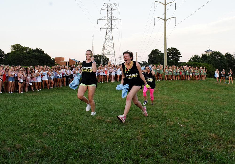 Newly recruited members of Gamma Phi chapter of Sigma Kappa are animated to join their sorority group during Bid Day celebrations at Greek Village on Tuesday, Sept. 3, 2019. Their motto is "One Heart, One Way" and is the first sorority founded on North Carolina State University's campus.