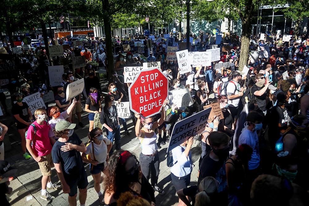 Protesters pack the area in front of the Wake County Courthouse during the protests in downtown Raleigh against police violence on Saturday, May 30, 2020. The nationwide protests against the killing of George Floyd by police in Minnesota have led to a week of riots and violence.