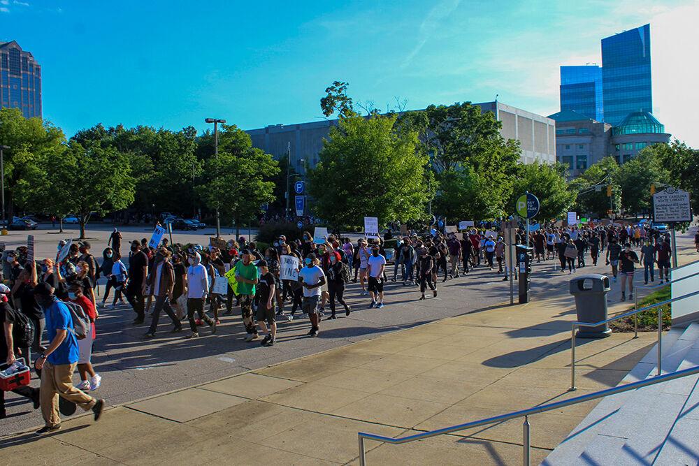 The protesters march for Black Lives Matter and for an end to police brutality in Raleigh on Monday, June 1, 2020. The protest was peaceful during its duration.