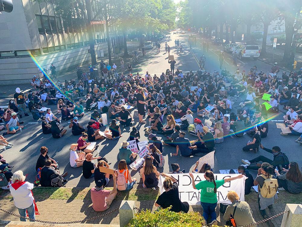 The protesters all sit during the Black Lives Matter protest in Raleigh on Monday, June 1, 2020. The protest was peaceful during its duration.