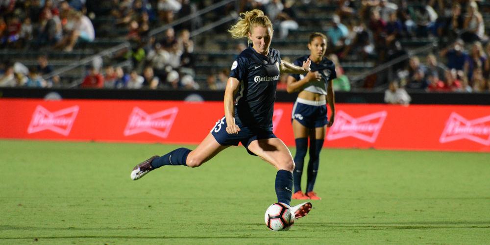 NC Courage midfielder Sam Mewis takes a shot during the club's match against Manchester City Women at WakeMed Soccer Park on August 15, 2019. The Courage won, 2-1.