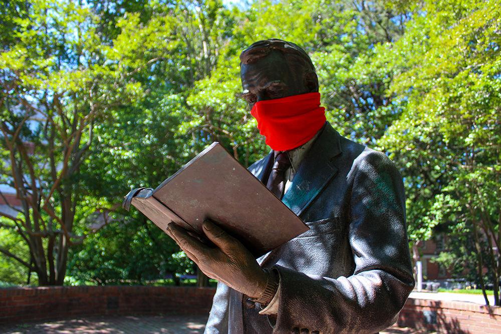 A statue on campus is seen wearing a mask on Saturday, May 9, 2020.