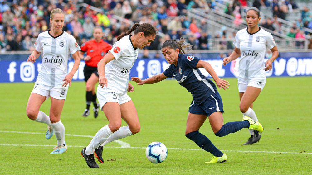 NC Courage midfielder Debinha fights for the ball on Sunday, Oct. 20 at WakeMed Soccer Park. Debinha scored one goal as the Courage won 4-1 to advance to the NWSL championship final.