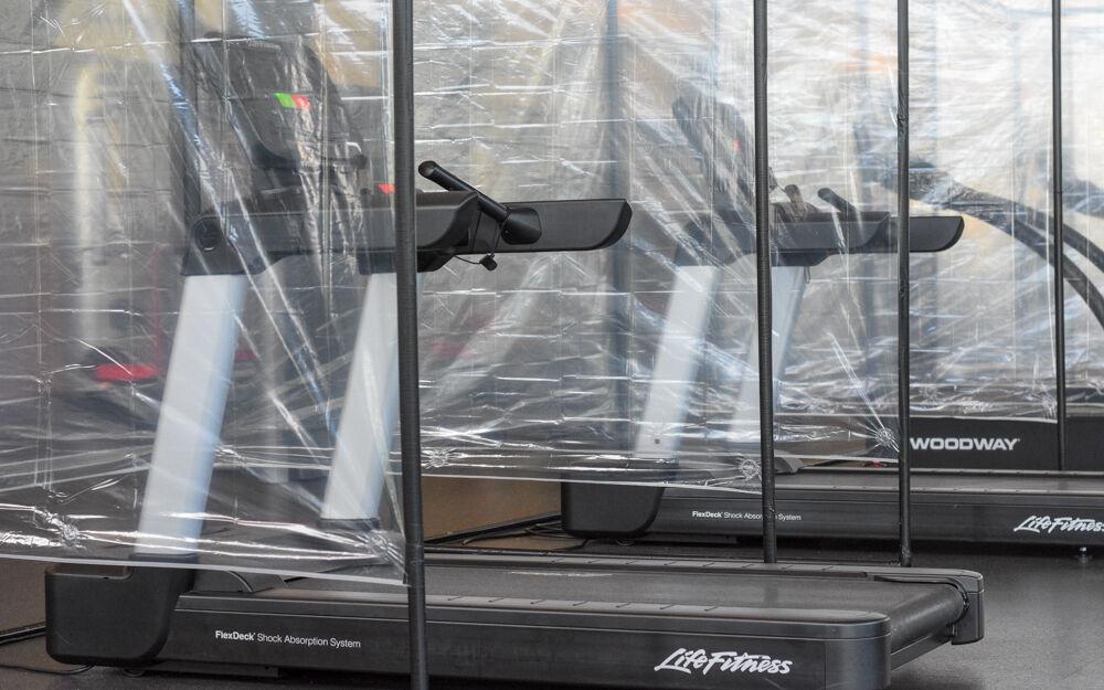 Using shower rods and pipes, WellRec created individual pods at each treadmill.