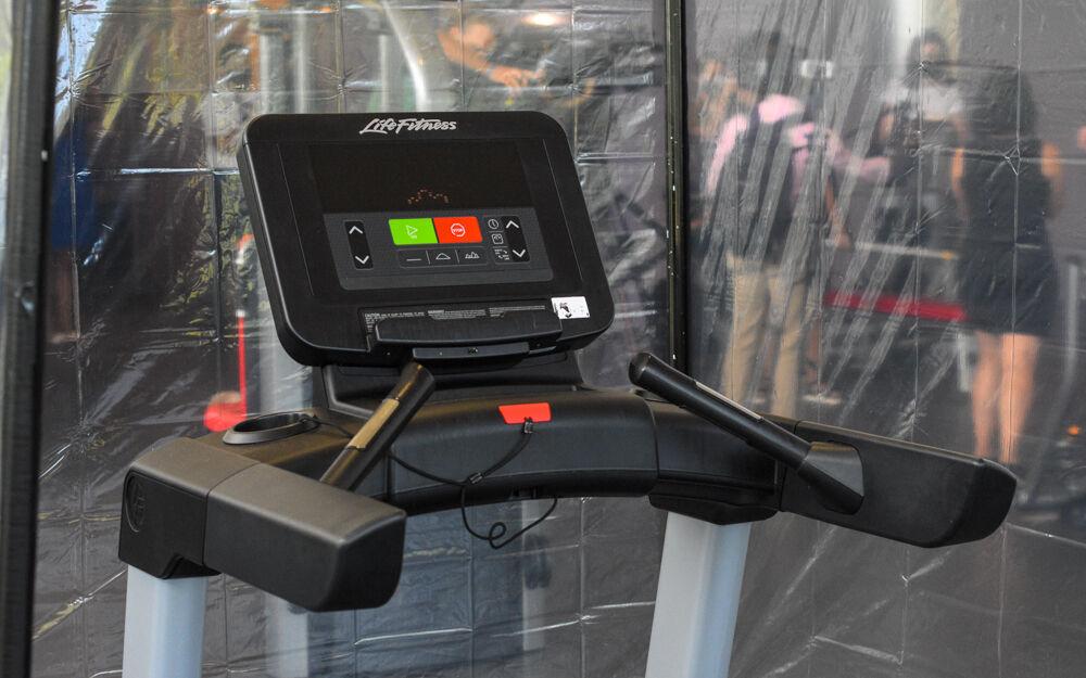 Using shower rods and pipes, WellRec created individual pods at each treadmill.