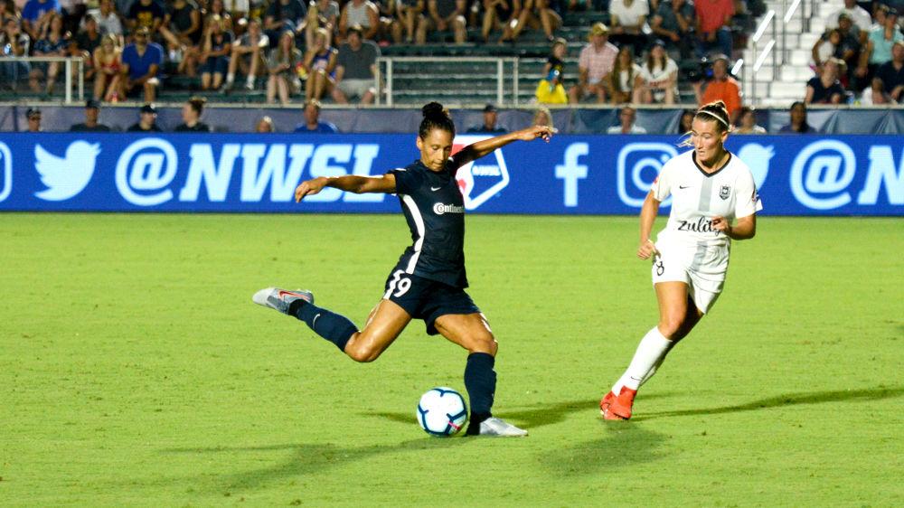NC Courage forward Lynn Williams takes a shot during the club's match against Reign FC at WakeMed Soccer Park on Saturday, July 13, 2019. Lynn scored a goal as the Courage topped the Reign, 2-0.