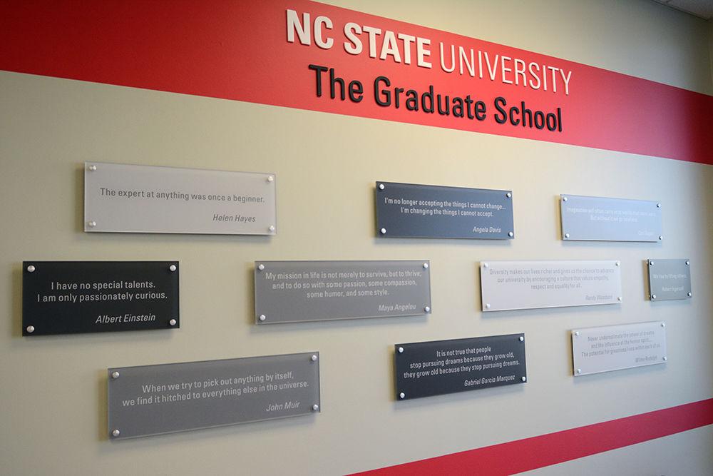 Walls plaques display famous quotes in the Graduate School Office. The Graduate School Building is located to the right of Wilson College of Textiles in the Centennial Campus. The Graduate School caters to the masters and doctoral students at NC State.