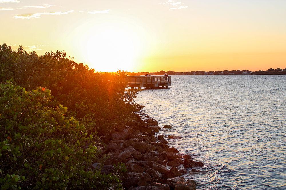 The sun sets over the dock at Sandsprit Park in Florida on Wednesday, June 17, 2020.