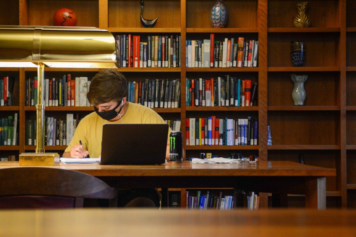 Blake Albright, a second-year studying biology, studies at D.H. Hill Library on Thursday, Aug. 20, 2020. Due to the COVID-19 pandemic, the library is only open to students and faculty, and no longer open to the public.