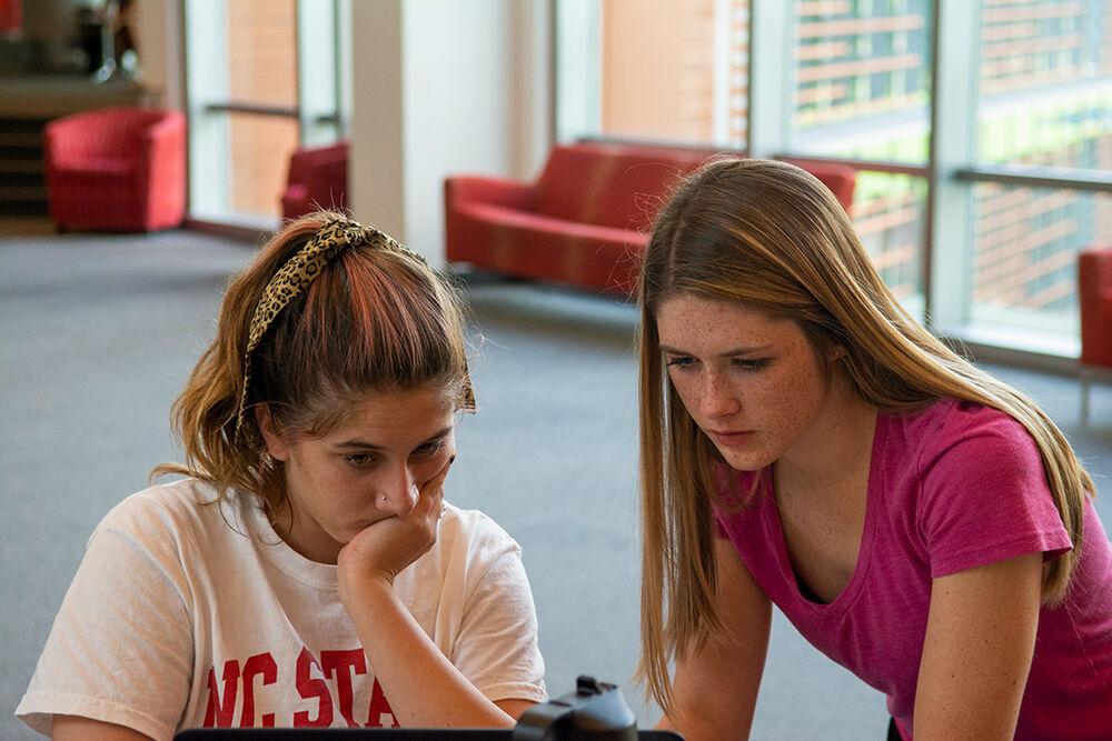 Brianna Walker, left, a 1st year studying design studies, studies with Caroline Lessard, a 1st year studying psychology, on the second floor of the Tally Student Center on Tuesday, August 11th, 2020.&#160;