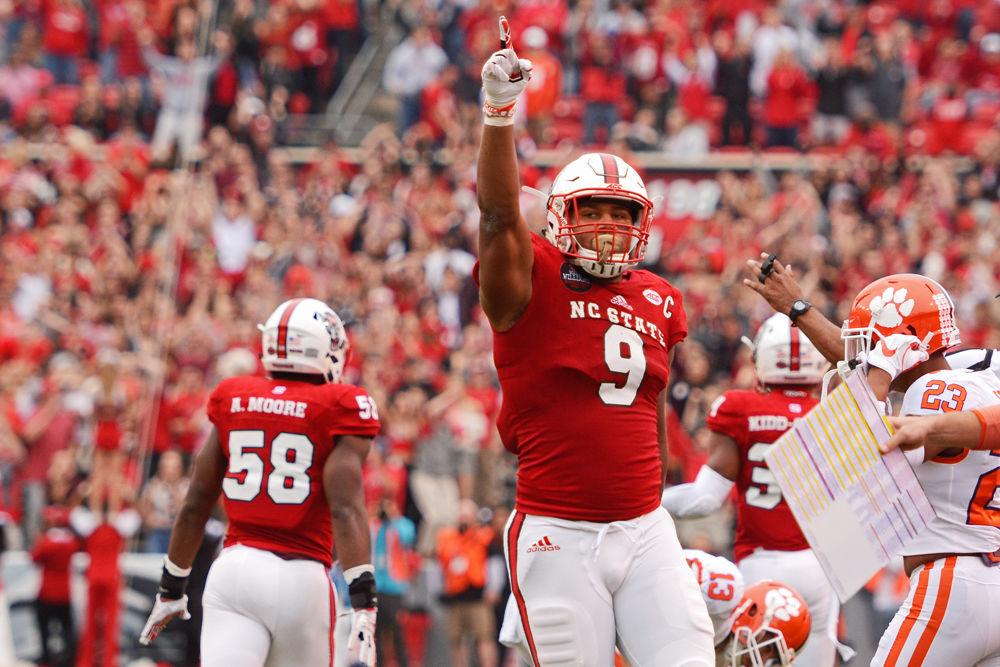 Senior defensive end Bradley Chubb points upward in celebration on Saturday, Nov. 4, 2017 at Carter-Finley Stadium. The Wolfpack lost to Clemson 38-31.