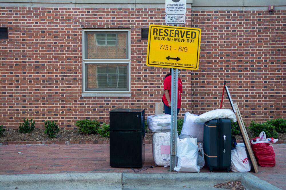 Luggage is unloaded next to Tucker Residence Hall during move in on Saturday, Aug. 1, 2020. Students were given specific move in time slots to reduce the amount of people in the dorms.