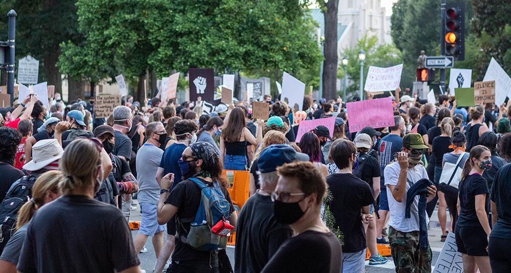 Protesters gather in front of the Wake County court house in Downtown Raleigh on Friday, Aug. 28, 2020. The march began at 7 pm and was in protest of the police brutality that Jacob Blake and many other African American men and women face.