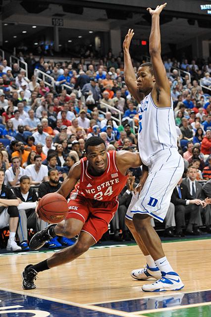 Sophomore forward T.J. Warren drives down the baseline while redshirt-sophomore forward Rodney Hood defends.