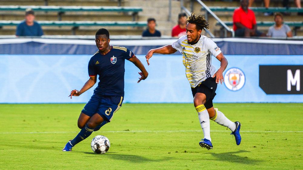 NCFC midfielder Dre Fortune dribbles against Pittsburgh Riverhounds SC on Saturday, Aug. 17 at WakeMed Soccer Park. Fortune totaled two goals and one assist in NCFC&#8217;s 5-0 win.