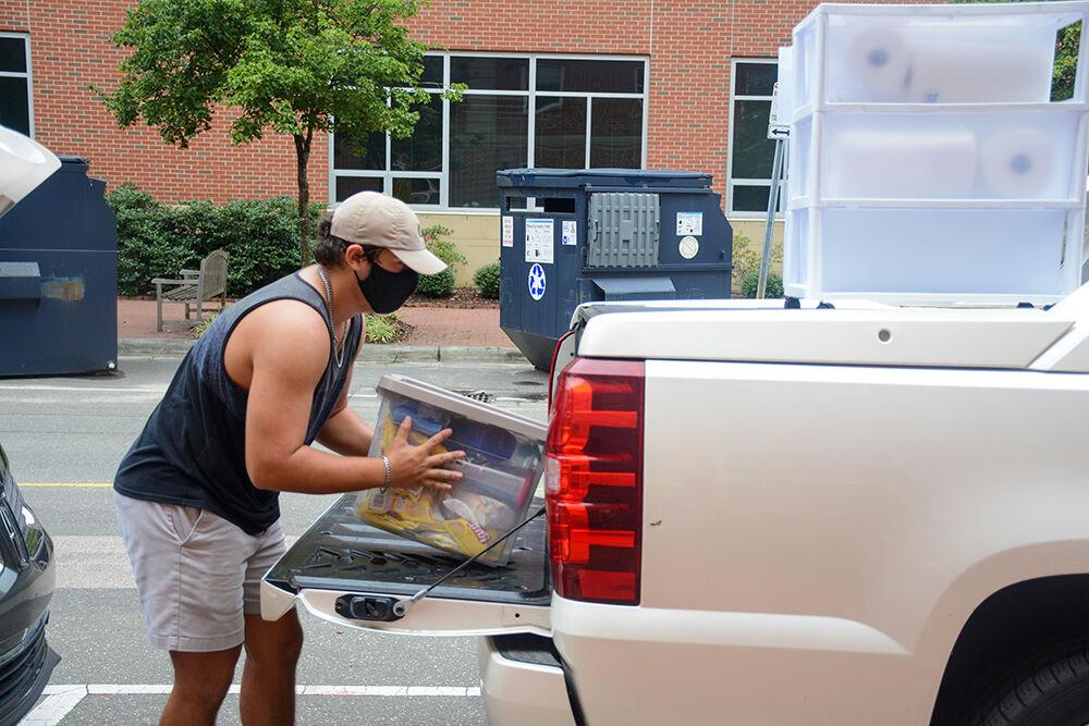 Alex Crandall, a first-year in exploratory studies, loads up his truck during his move out appointment at Tucker Residence Hall on Tuesday, Sept. 1, 2020. Students were given specific move out times to reduce the amount of people in the dorms at a time. Crandall said that he knew the abrupt move out was coming and was annoyed that the university chose to move students on to campus in the first place.