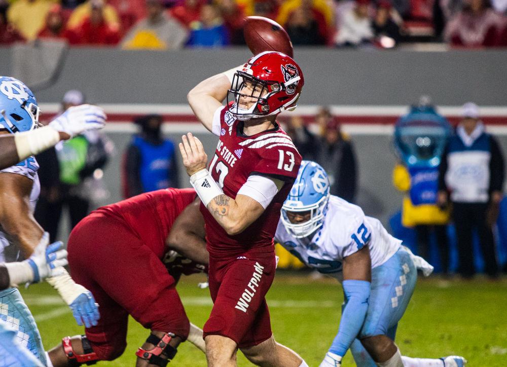 Redshirt freshman quarterback Devin Leary passes versus UNC on Saturday, Nov. 30, 2019 at Carter-Finley Stadium. Leary threw for 98 yards and had one touchdown in the 41-10 loss.