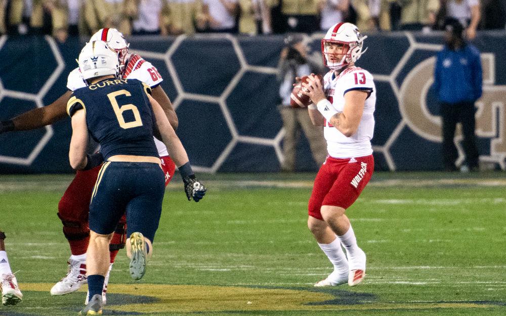 Redshirt freshman quarterback Devin Leary goes through his reads during NC State's game against Georgia Tech at Bobby Dodd Stadium on Nov. 21, 2019. The Wolfpack lost 28-26.
