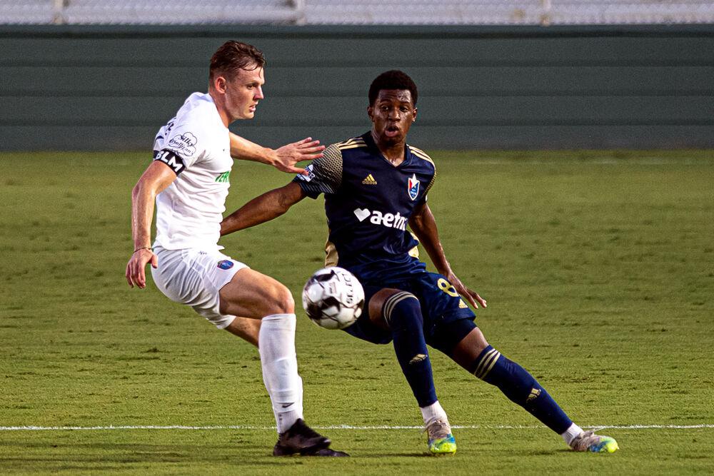 North Carolina FC midfielder Dre Fortune passes against Memphis 901 FC on Thursday, Sept. 10 at WakeMed Soccer Park. NCFC lost 3-2.