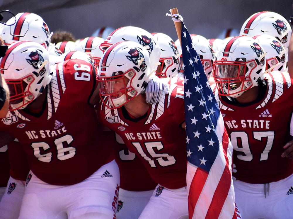 The team prepares to run out of the tunnel against ECU on Saturday, August 31, 2019 in Carter-Finley Stadium. The Pack had a 34-6 win over the Pirates.