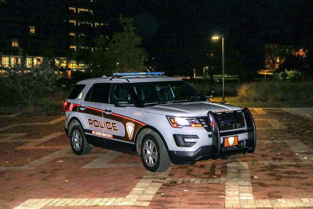 An NC State police car sits on the Brickyard on Tuesday, Nov. 20, 2018. The campus police department provides services including the WolfGuard ID and Ride-Along programs, safety escort and lost and found property.