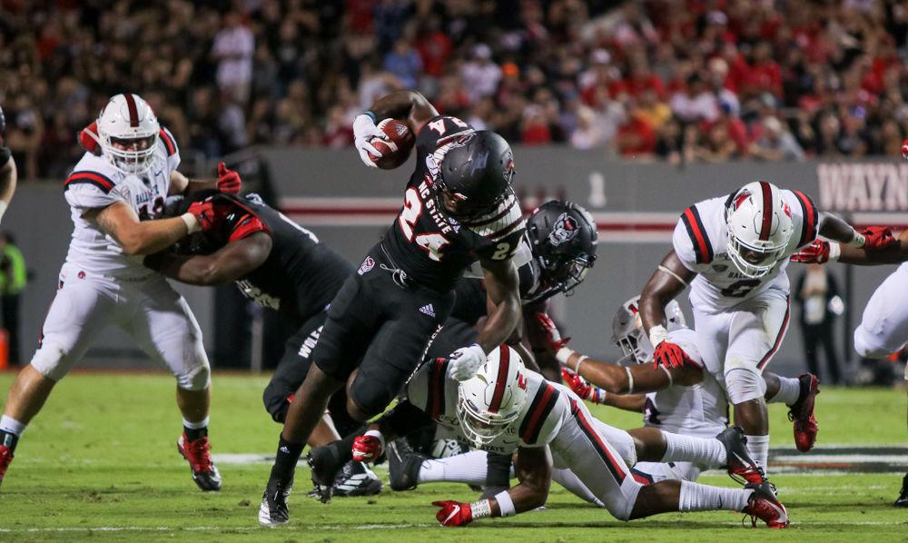Freshman running back Zonovan Knight rushes during the game versus Ball State on Saturday, Sep. 21, 2019 at Carter-Finley Stadium. Knight had 36 rushing yards during the game the Wolfpack won 34-23.