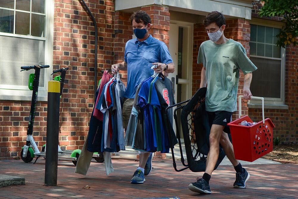 Ryan Proud, a first year in exploratory studies, moves out of Tucker Residence Hall along with the help of his dad on Tuesday, Sept. 1, 2020. Proud said that he enjoyed his two weeks on campus more than he thought he would. &#8220;I&#8217;m upset about moving out," he said. "I hope things are back to normal in the spring.&#8221;