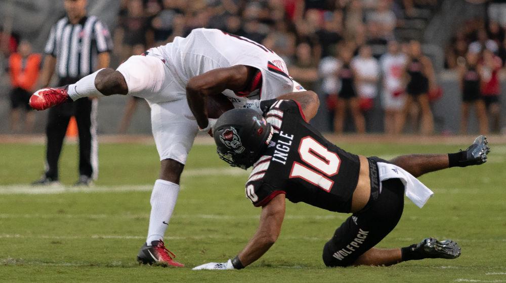 Sophomore safety Tanner Ingle tackles a Ball State player on Saturday, Sep. 21, 2019 at Carter-Finley Stadium. Ingle had 11 sacks during the game the Wolfpack won 34-23.