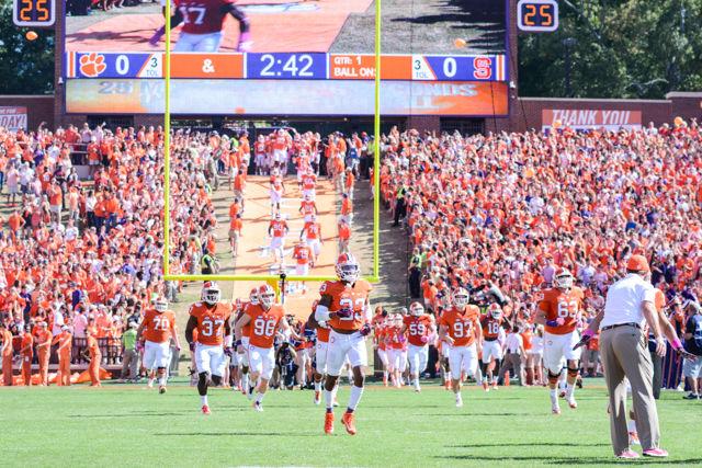 Clemson enters the field after touching Howard's Rock. The Wolfpack suffered a heartbreaking 24-17 overtime defeat at Death Valley in Clemson, SC on Oct. 15, 2016.