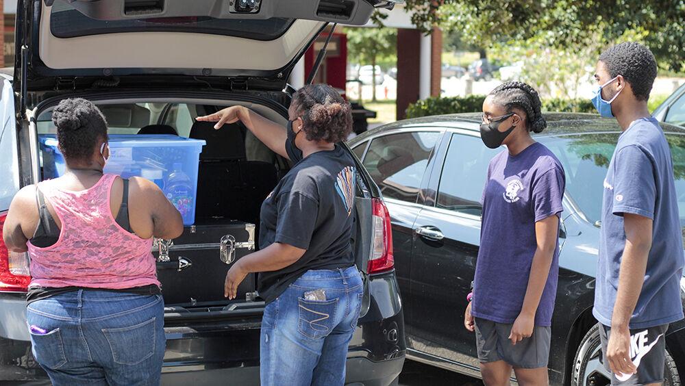 Keshawn Miller, a first-year studying electrical engineering, moves his belongings out of his freshman dorm on Sunday, Aug. 30, 2020. NC State made the decision to move all students living in on campus housing on August 26th. Keshawn was upset to have to leave his dorm and go home.