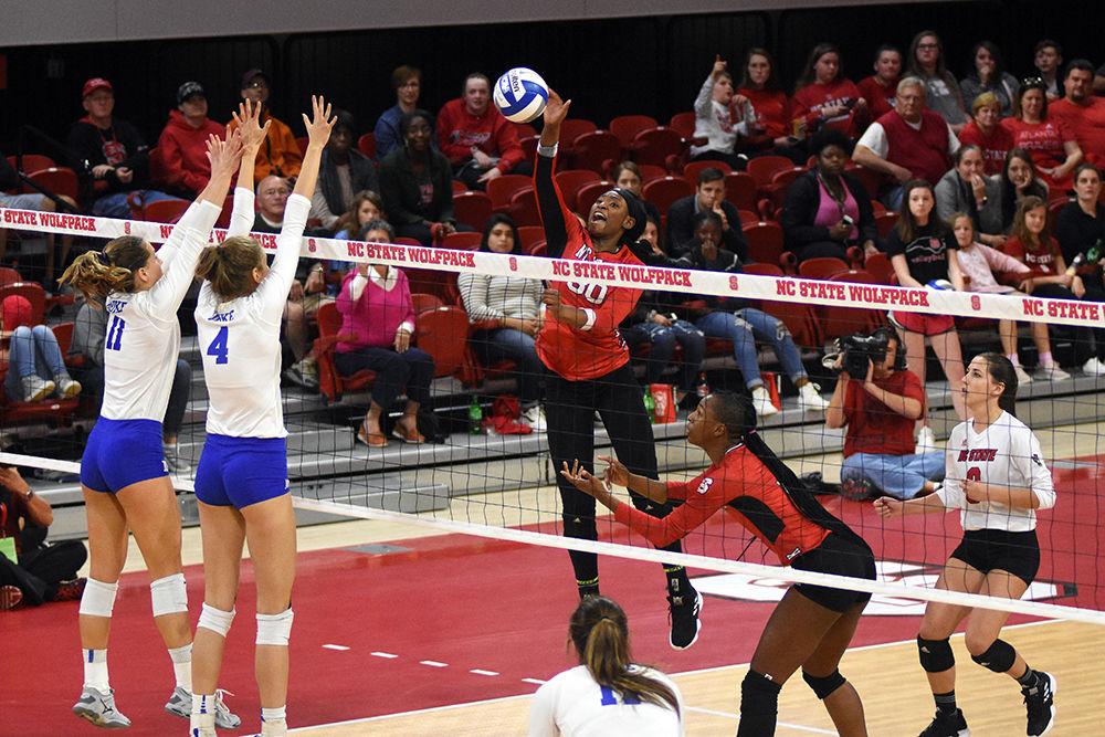 *Editor's note: the original photo has been replaced.Senior outside hitter Teni Sopitan spikes the ball during the volleyball game against Duke on Sunday, Nov. 4, 2018, in Reynolds Coliseum. The Wolfpack beat the Blue Devils 3-2, with Sopitan scoring 21 of the Wolfpack's 63 kills.