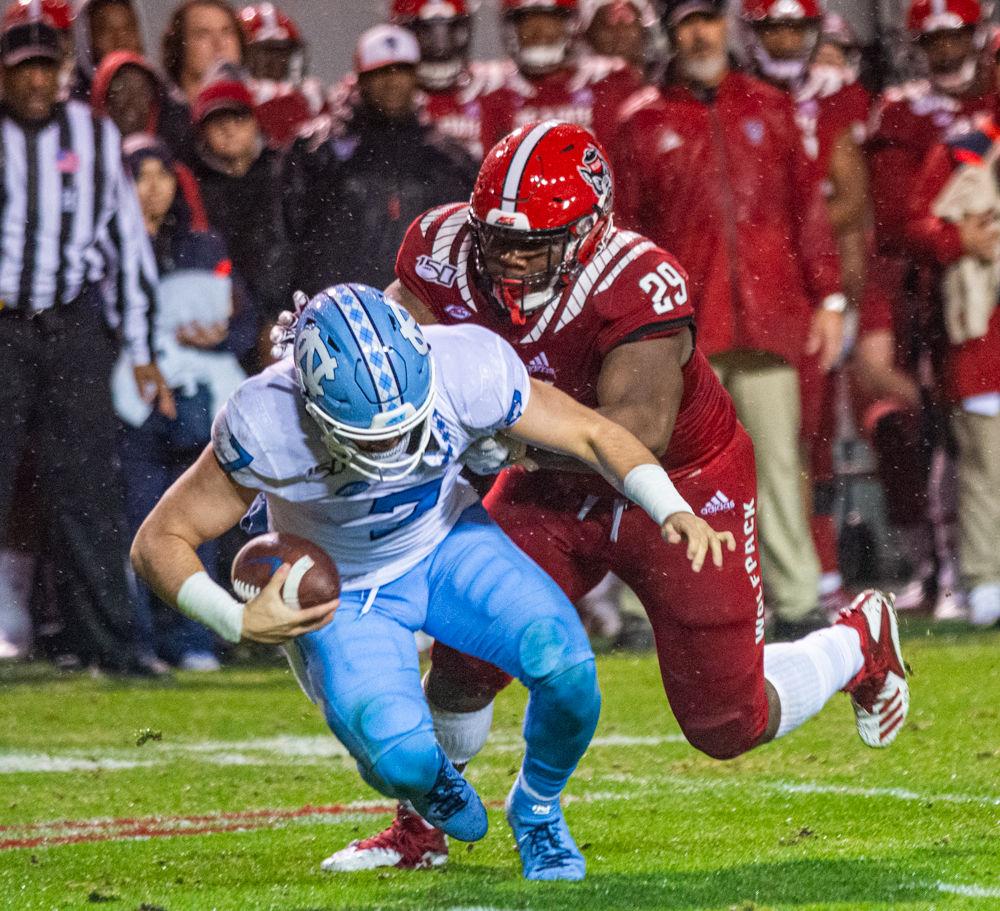 Sophmore defensive tackle Alim McNeill sacks UNC's quaterback on Saturday, Nov. 30, 2019 at Carter-Finley Stadium. McNeill had two sacks and five tackles in the 41-10 Loss