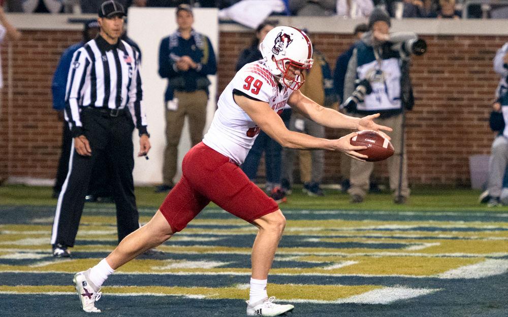 Redshirt sophomore punter Trenton Gill attempts a punt during NC State's game against Georgia Tech at Bobby Dodd Stadium on Nov. 21, 2019. The Wolfpack lost 28-26.