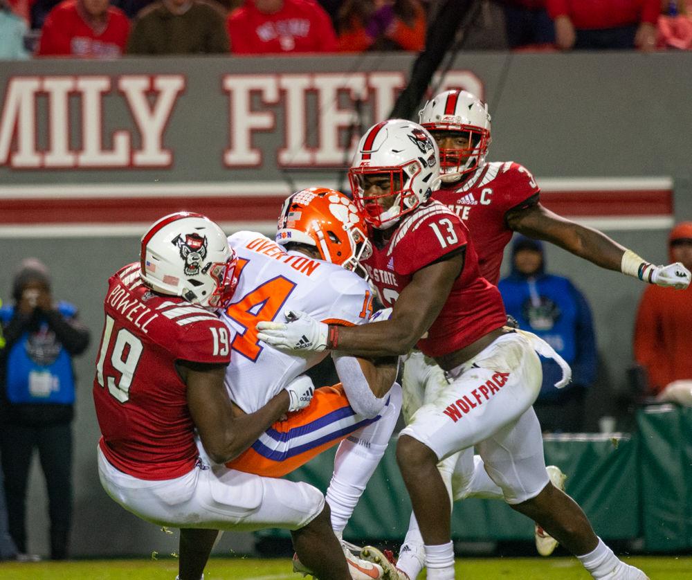 Freshman wide receiver Cecil Powell and sophmore nickleback Tyler Baker-Williams tackles Clemson wide receiver Diondre Overton on Saturday, Nov. 9, 2019. Powell had two tackles during the game and Baker-Williams had three tackles in the 55-10 loss.