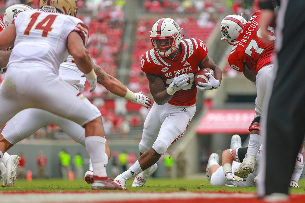 Freshman running back Ricky Person Jr. carries the rock to the 3-yard line to set up a touchdown. Person had 92 yards on 17 carries during the 28-23 win over Boston College on Saturday, Oct. 6, 2018 in Carter-Finley Stadium.