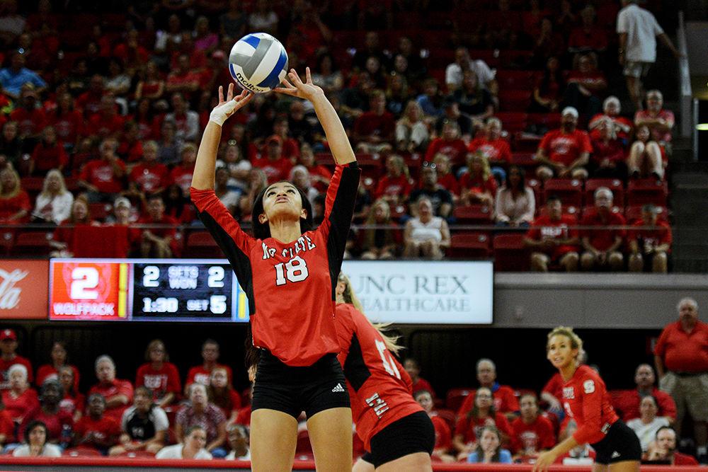 Redshirt freshman setter, Nina Sharpton sets the ball against UNC on October 2 in Reynolds Coliseum. Sharpton played in five sets and had one kill, 50 assists, and 11 digs in the 2-3 loss against UNC.