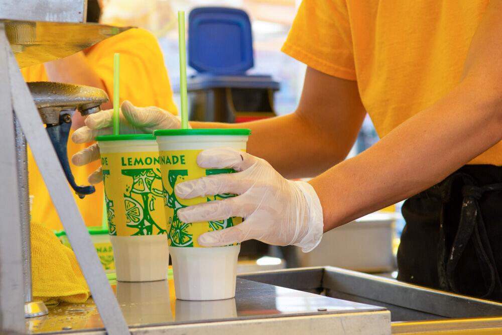 Lemonades are prepared at the NC State Fair Food days event on Wednesday, Oct. 21. 2020. Fair workers wore masks and gloves to prevent the spread of COVID-19.
