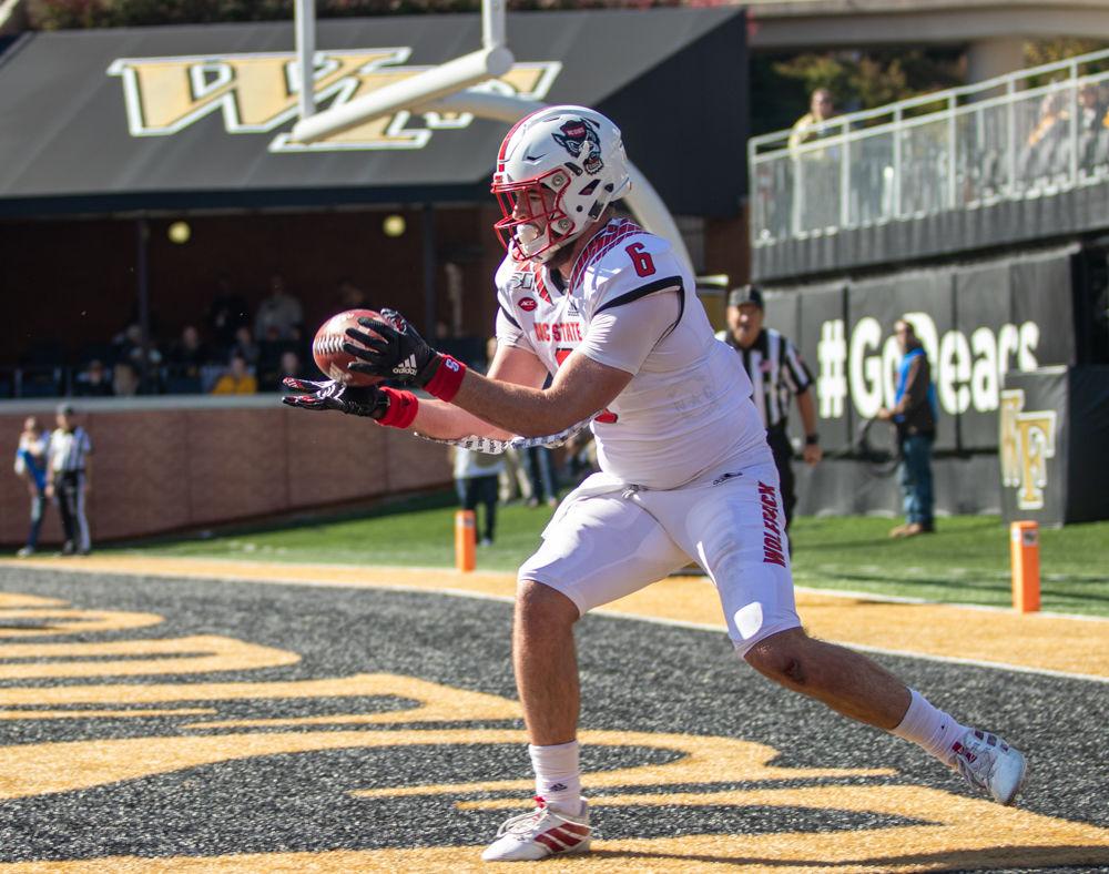 Redshirt junior tight-end Cary Angeline recieves a touchdown pass versus Wake Forest on Saturday, Nov. 2, 2019 at BB&amp;T field. The Wolfpack lost 44-10.