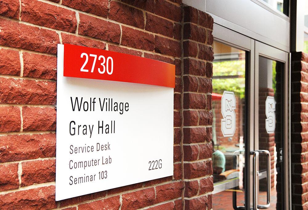 The entrance to Wolf Village's Gray Hall stands among the rest of Wolf Village apartments on Wednesday, July 26. Three incidents of sexual assault were reported to NC State University Police on Friday, July 21. University Police sent out an official email to all of campus via WolfAlert the following Sunday, stating that the three incidents were perpetrated by male students whom the female survivors knew while they were at a party. The message also stated that University Police is continuing investigation of the reports.