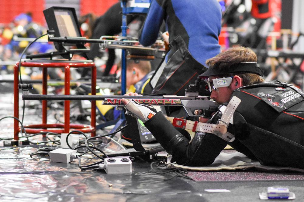 Senior shooter Lucas Kozeniesky takes aim at the target while in the prone position during the Wolfpack's meet against North Georgia on Jan 29. Kozeniesky marked perfect 100s in both series of the prone position to earn a 577 overall in the smallbore event of the 4657-4547 win at Reynolds Coliseum.