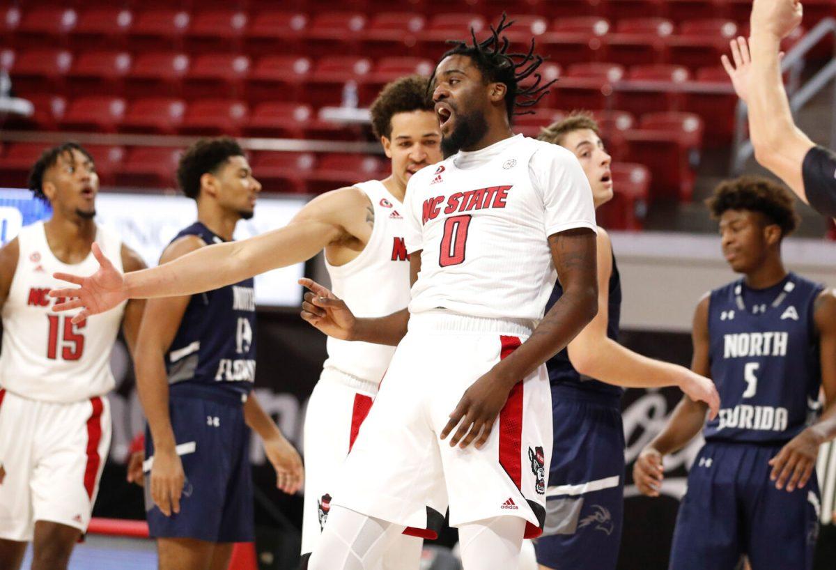 N.C. State's D.J. Funderburk (0) celebrates after making the shot while being fouled during the first half of N.C. State&#8217;s game against North Florida in the Mako Medical Wolfpack Invitational at Reynolds Coliseum in Raleigh, N.C., Friday, Nov. 27, 2020.