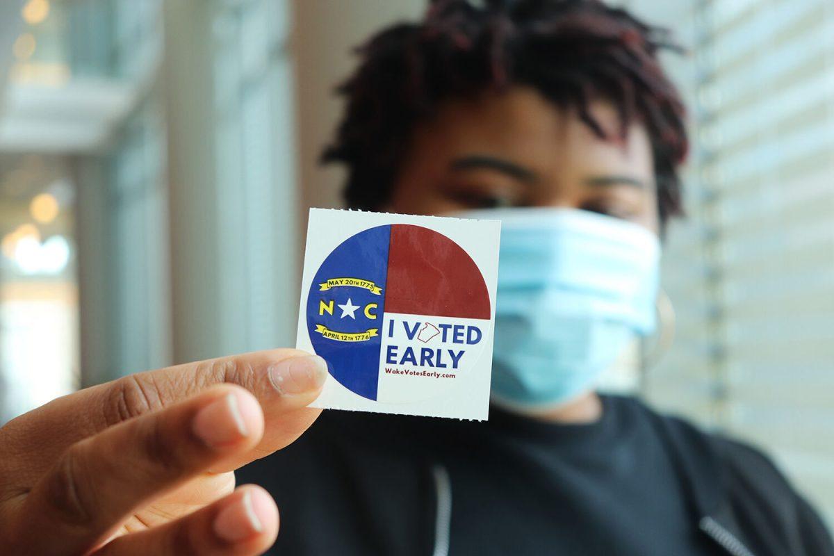 A voter poses for a picture after voting in&#160;the State Ballroom in Talley Student Union on Saturday, Oct. 31, 2020. Talley Student Union hosted early voting from October 15th to October 31st in the State Ballroom.