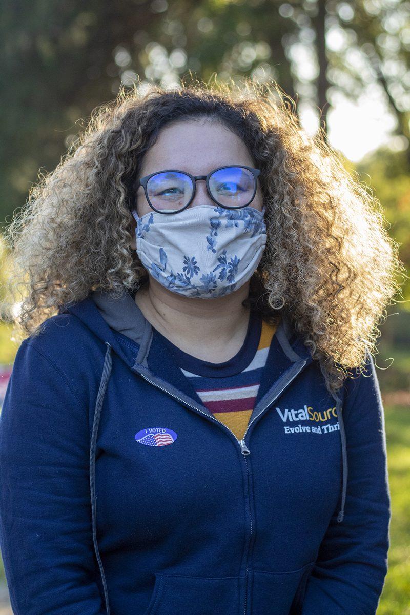 Jessica Vieira, who works in education technology, poses for a picture outside of Pullen Community Center after voting on Tuesday, Nov. 3, 2020.