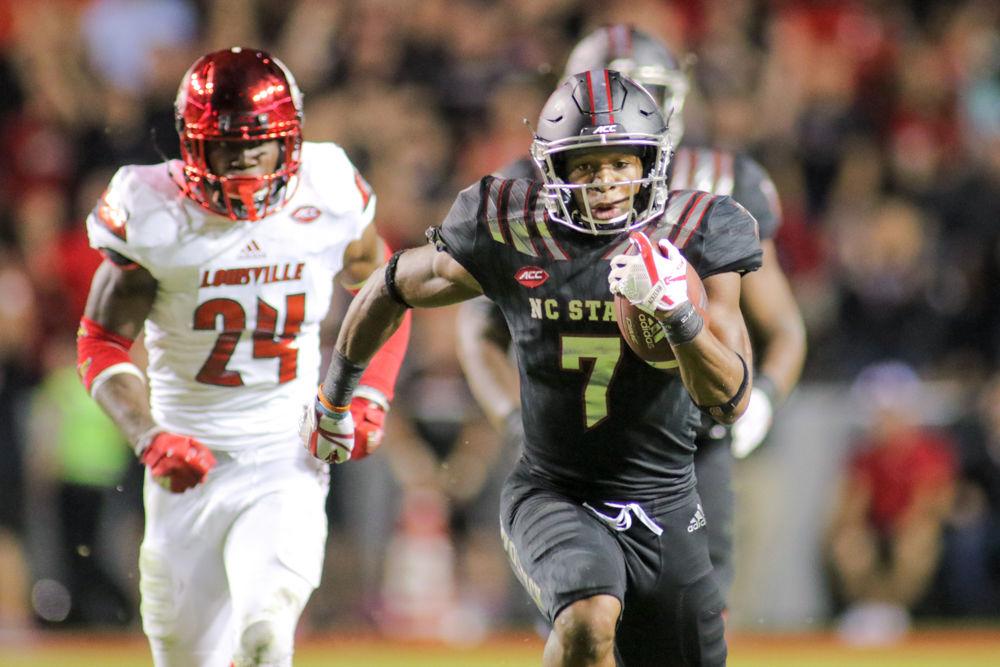 Junior running back Nyheim Hines rushes for a huge gain. Hines accounted for 225 yards of the 520 offensive yards in the 39-25 win over Louisville on Thursday, Oct. 6 in Carter-Finley Stadium.