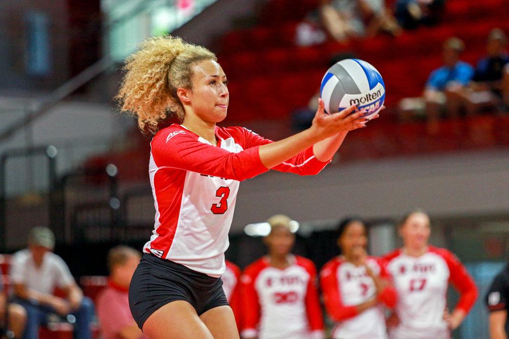Sophomore opposite hitter Melissa Evans prepares a serve. Evans had one of the Pack's six aces to along with her team-high 12 kills in the 3-0 win over Campbell on Sunday, Sept. 9, 2018 in Reynolds Coliseum.