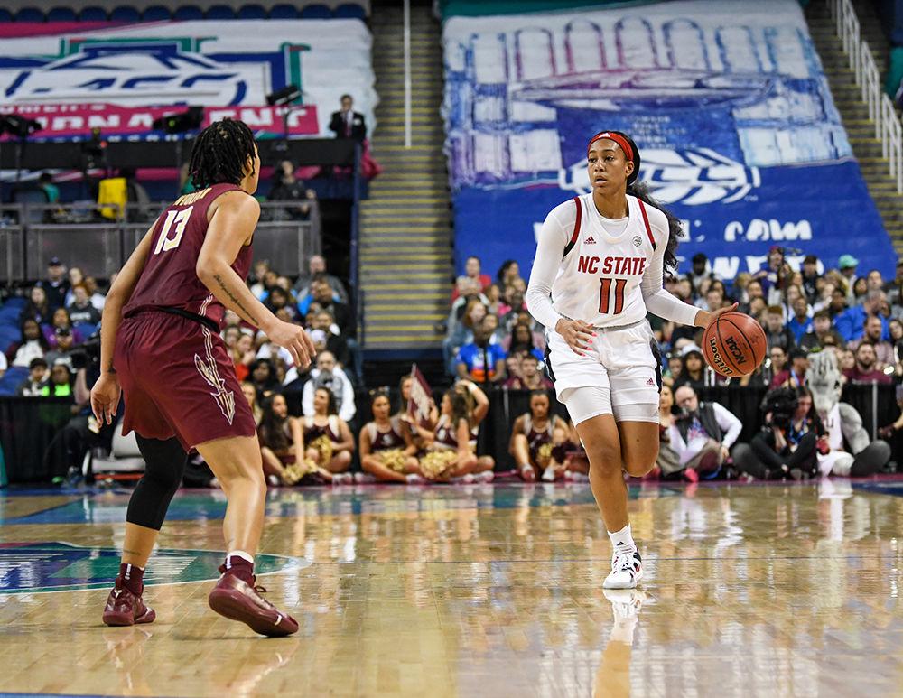 Freshman wing Jakia Brown-Turner drives down the court during the championship game of the 2020 ACC Women's Tournament versus the Florida State Seminoles on Sunday, March 8, 2020 in the Greensboro Coliseum.&#160;The Wolfpack beat the Seminoles 71-66 to win their first ACC title since 1991.