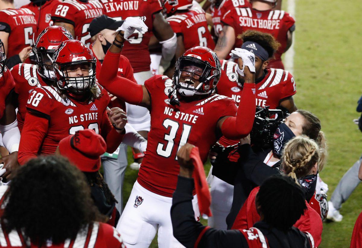 N.C. State&#8217;s Vi Jones (31) celebrates after Jones blocked the field goal attempt by Liberty&#8217;s Alex Barbir during the second half of N.C. State&#8217;s 15-14 victory over Liberty at Carter-Finley Stadium in Raleigh, N.C., Saturday, Nov. 21, 2020.