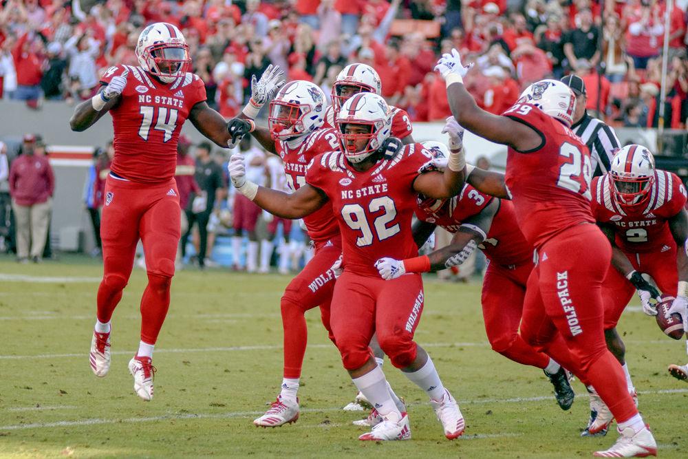 Redshirt junior defensive tackle Larrell Murchison celebrates after an interception against Florida State on Saturday, Nov. 3 at Carter-Finley Stadium. The Wolfpack won 47-28.