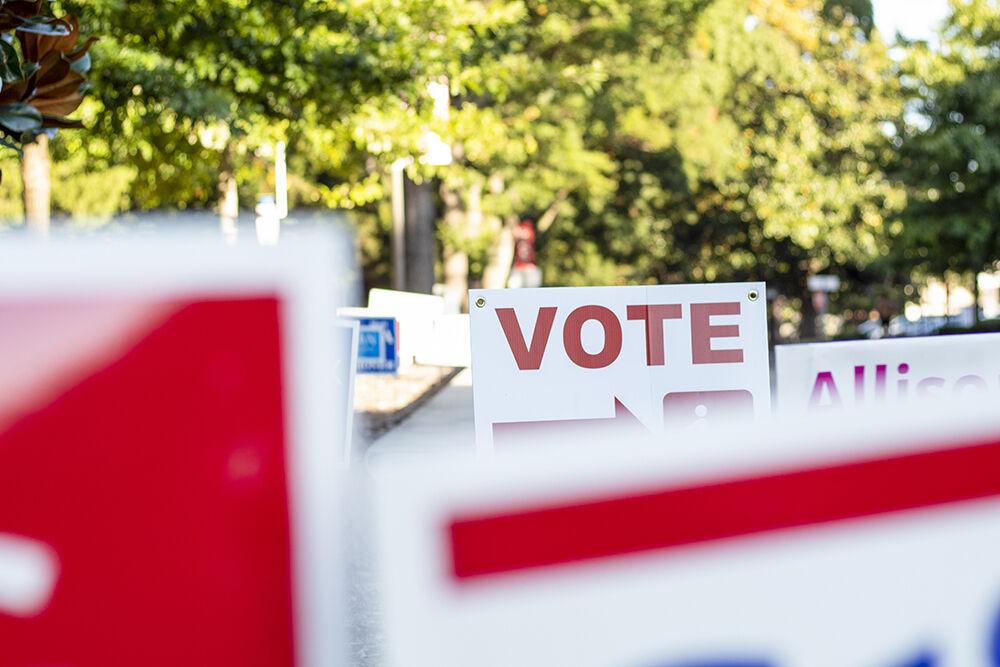 A vote sign sits with a variety of other campaign signs outside of Talley Student Union on Wednesday, Oct. 14th, 2020.